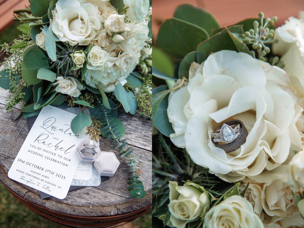 Close-up of wedding rings beside the invitation suite.